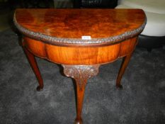A Victorian burr walnut fold over games table, COLLECT ONLY.