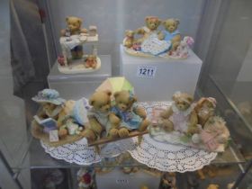 Five large Cherished Teddies figures.