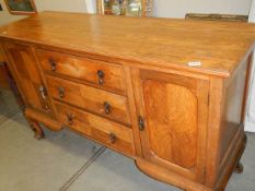 A good quality oak two door/three drawer sideboard, COLLECT ONLY.