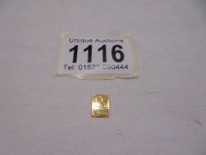A 1 gram fine 24ct gold ingot.