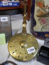 A Victorian brass chestnut roaster,