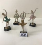 A set of small ballet dancers on bases