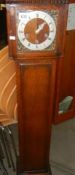 An Edwardian oak Westminster chime Granddaughter clock (no key or pendulum). COLLECT ONLY.