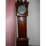 A 30 hour oak cased Grandfather clock with painted dial, cross banded inlay,