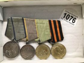 A set of four Russian medals.