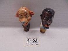 Two vintage novelty porcelain head bottle stoppers.