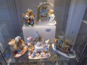 Five large Cherished Teddies figures.