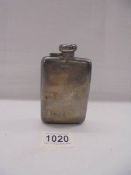 A hall marked silver hip flask.