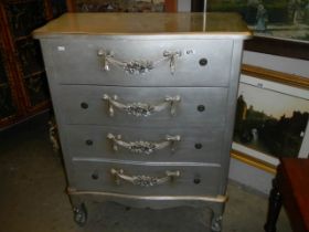 A vintage French style four drawer chest with swag detail, COLLECT ONLY.