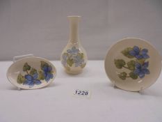A Moorcroft vase, bowl and pin dish,