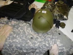 A large lot of body armour, fatigues, helmets, camo gear etc., COLLECT ONLY.