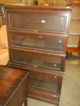 A four tier Globe Wernick book case. COLLECT ONLY.