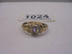 A 9ct gold sapphire and diamond ring, size M, 1.8 grams.