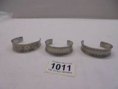 Three Jorgen Jensen pewter cuffs (Nos 150, 168 and 185).