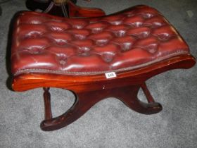 A good quality deep buttoned sabre leg stool in red, COLLECT ONLY.