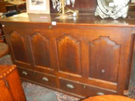 A large period mule chest with carved panels (top warped), COLLECT ONLY.