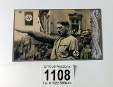 A picture of A Hitler signed on back and dated 1943.