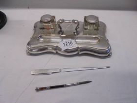 An electroplate Barker Bros of Birmingham inkstand with pen tray, ink pen with banded agate handle