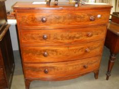 A mahogany four drawer bow front chest. COLLECT ONLY.