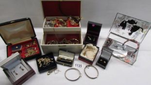 A mixed lot of jewellery including gold, silver and watches.