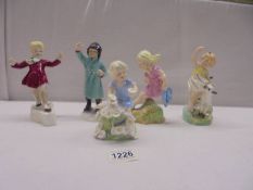 Five Royal Worcester Months of the Year figurines - January. February, March, April.