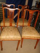 A set of four mahogany inlaid dining chairs, COLLECT ONLY.