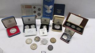 A mixed lot of coins including £2 silver proof two coin set, 4 X £5 coins, silver proof £!,