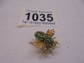 A 14ct yellow gold enamel bug brooch, 3.21 grams.