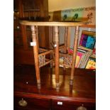 A folding table with brass top. COLLECT ONLY.