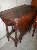 An oak gate leg drop leaf table, COLLECT ONLY.