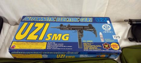 A UZI air soft automatic electric air pistol COLLECT ONLY