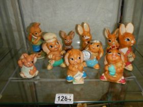 Ten assorted Pendelfin rabbits.