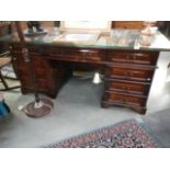 A good quality mahogany double pedestal desk with glass top, COLLECT ONLY.