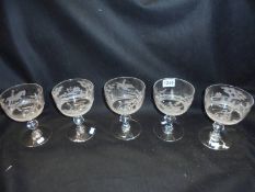 Five superb quality etched champagne glasses depicting hunting scenes.
