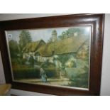 An oak framed cottage scene in wool, COLLECT ONLY.