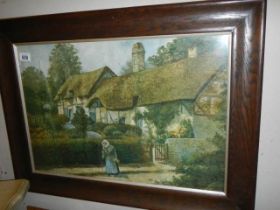 An oak framed cottage scene in wool, COLLECT ONLY.