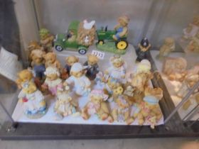 Twenty Cherished Teddies figures.