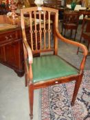 An early 20th century mahogany inlaid elbow chair, COLLECT ONLY.