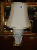 A good quality table lamp on square brass base and with lily decoration, COLLECT ONLY.