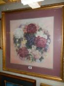 A framed and glazed floral display painting, signed but indistinct. COLLECT ONLY.