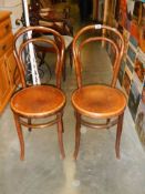 A pair of bentwood chairs with poker work seats, COLLECT ONLY.