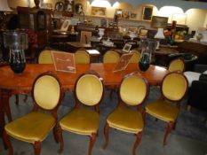 A 10 foot French mahogany dining table with ten chairs, COLLECT ONLY.