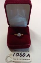 A diamond floral ring on 18ct gold (3.22g)