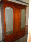 A Victorian mahogany inlaid combination wardrobe. COLLECT ONLY.