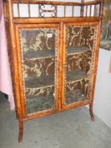 A late Victorian bamboo display cabinet (one piece of glass missing) COLLECT ONLY.