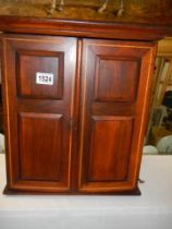 An Edwardian two door/four drawer cabinet, COLLECT ONLY.