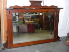 An early 20th century mahogany framed bevel edged over-mantel mirror, COLLECT ONLY.