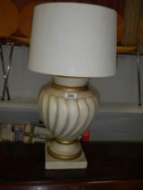 A nice ceramic urn shaped table lamp.