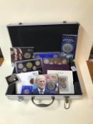 A case of coin sets & coins including 1999 wedding coin collection, Prince Philip Â£5 etc.