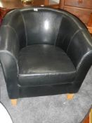 A black tub chair. COLLECT ONLY.